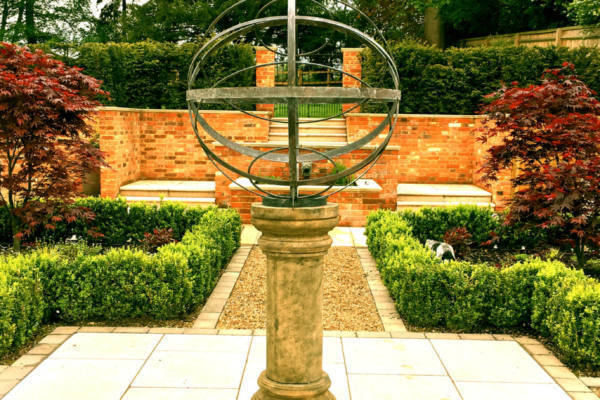 Bronze-Armillary-80cm-on-a-weathered-Doric-plinth-the-centre-piece-to-this-formal-garden-scaled-600x400 Bronze