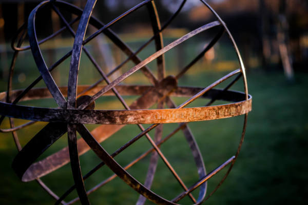 Bronze-Armillary-glowing-in-the-sunset-scaled-600x400 Bronze