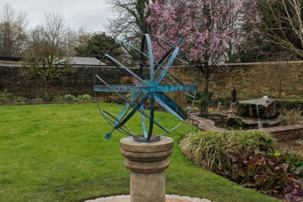 Bronze-Armillary-on-a-Weathered-Doric-scaled-600x400 Bronze