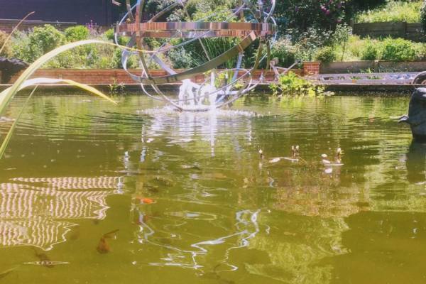 Stainless-Steel-Armillary-on-a-Carp-pond-600x400 Stainless Steel