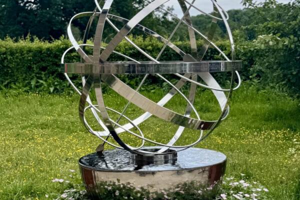 Stainless-steel-armillary-sphere-paired-with-Cascade-scaled-600x400 Cascade