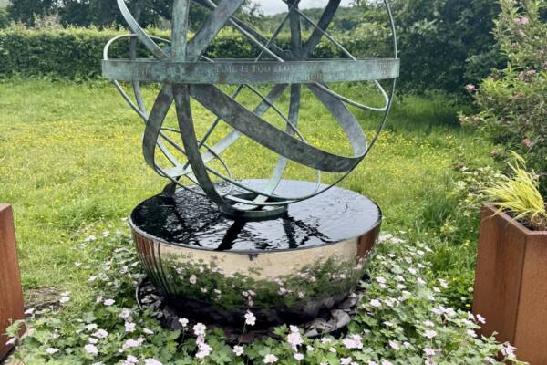 Verdigrised-bronze-armillary-sphere-paired-with-Cascade-scaled-600x400 Cascade